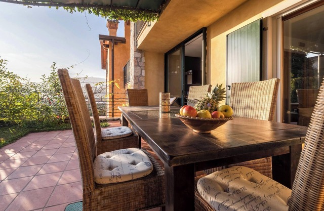 Cosy Apartment "Gardasee Castion" with Garden, Shared Pool, A/C & Wi-Fi