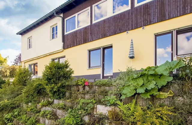 Cosy apartment with terrace and garden access in a quiet wooded area