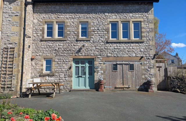 Cosy yet spacious property with private parking, close to the village centre.