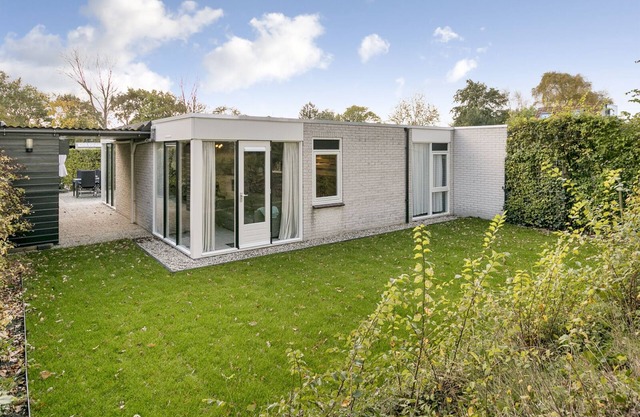 Cottage coast in South Holland behind the dunes by the sea