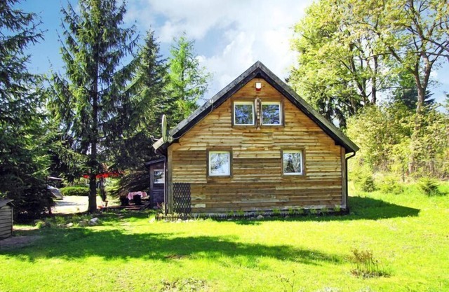 Cottage with large garden near lake