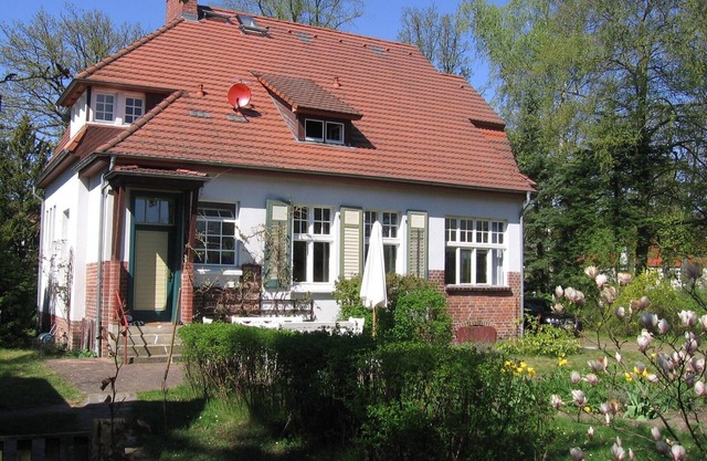 Country villa with garden, private jetty, rowing boat and sauna