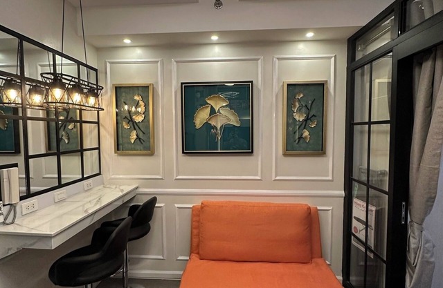 Cozy 1-bedroom with balcony condo with WiFi, AC in brilliant Quezon City