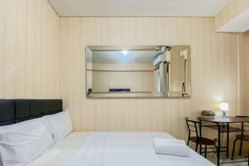 Cozy and Strategic Studio at Transpark Cibubur Apartment By Travelio
