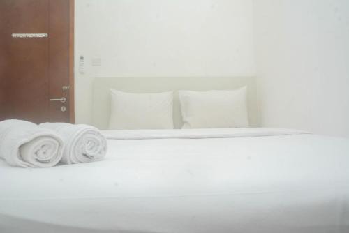 Cozy and Tidy 2BR at Signature Park Grande Apartment By Travelio
