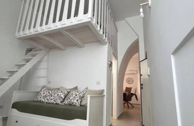 Cozy apartment in the historic center overlooking the main square.