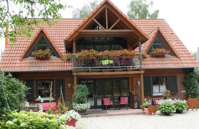 Cozy bright large vacation apartment in a wooden house