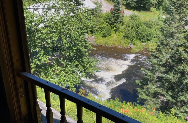 Cozy cabin overlooking Connecticut River waterfall on over 50 acres.