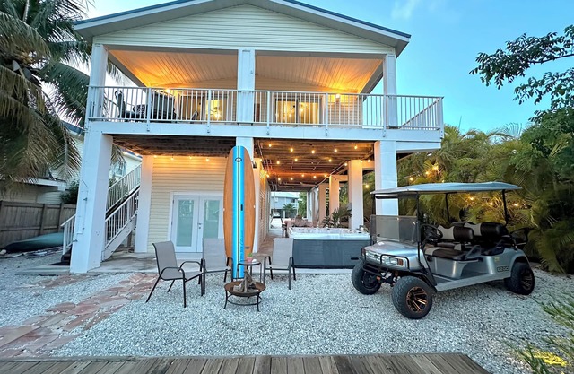 Cozy Canal-Front Home in Cudjoe Key — Dock, Hot-Tub & Golf Cart Included!