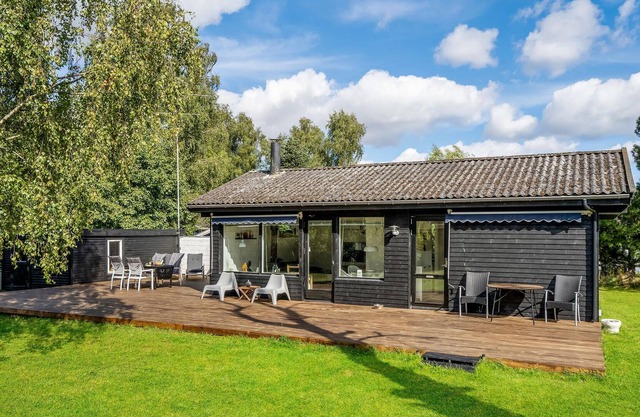 Cozy cottage located on a large fenced plot.