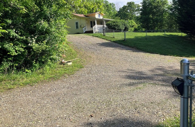 Cozy country home with great views and big porch. Family friendly great kitchen.