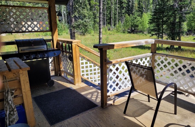 Cozy Fireside Cottage - White Goat