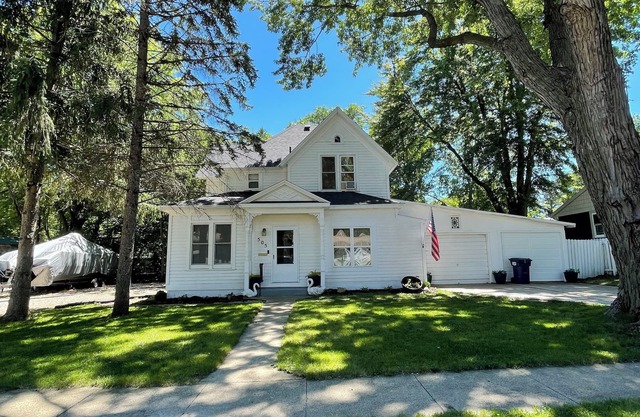 Cozy four bedroom home, private fenced backyard, minutes from East Okoboji.