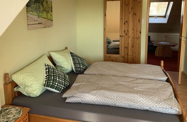 Cozy holiday apartment with a garden in a quiet location for the whole family