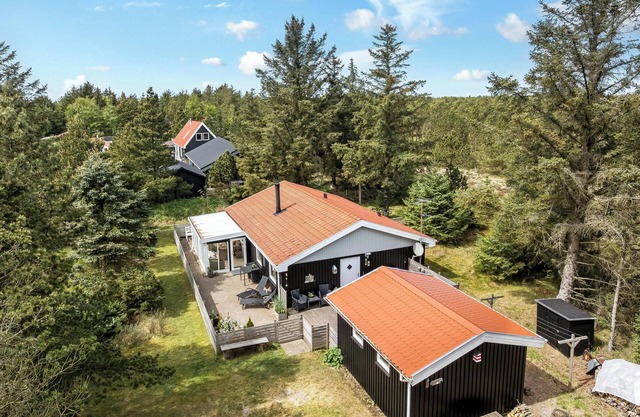 Cozy holiday home with indoor hot tub and sauna in Vorupør.