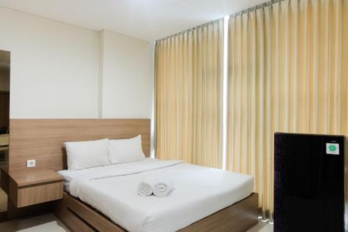 Cozy Studio Apartment at Brooklyn Alam Sutera By Travelio