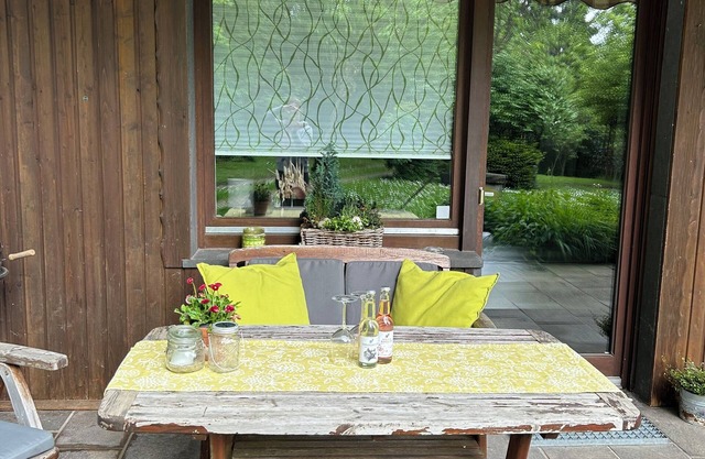 Cozy vacation apartment with covered terrace right on the edge of the forest