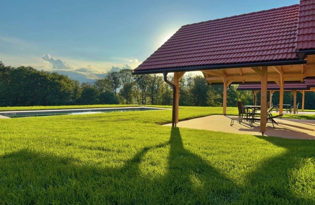 Cozy Wooden Chalet with Heated Pool – Scenic Green Views in Styria
