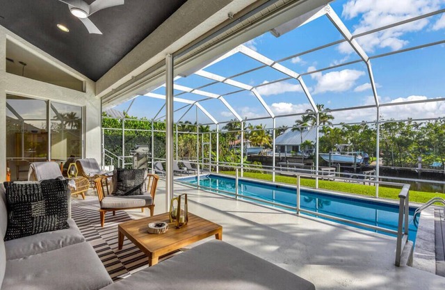 CURLEW CANAL - Modern Waterfront Home with Heated Pool