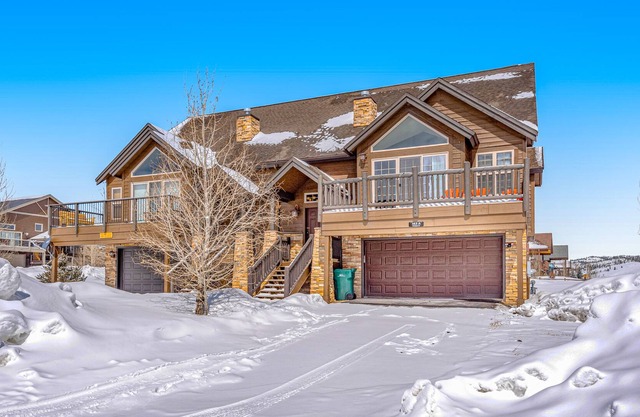 Delightful mountain-view duplex with fireplace, deck, grill, & wonderful views