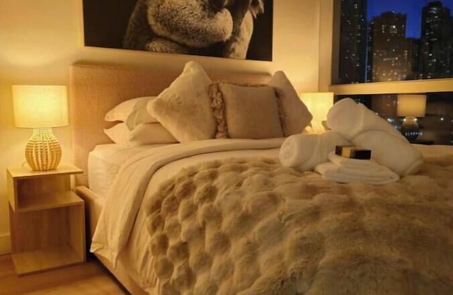 Deluxe 2br apt | Excellent location city views, balcony and heated indoor pool