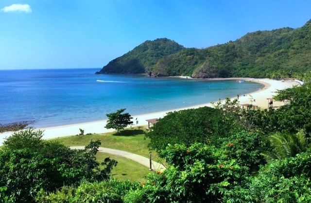 Deluxe family beach apartment with lagoon view at Pico De Loro