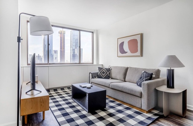 Deluxe Midtown West 2BR w/Doorman, Gym & W/D, nr Times Sq, by Blueground