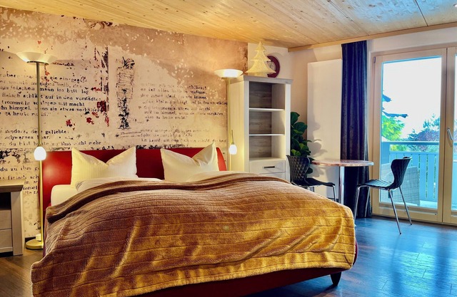 Deluxe triple room with balcony