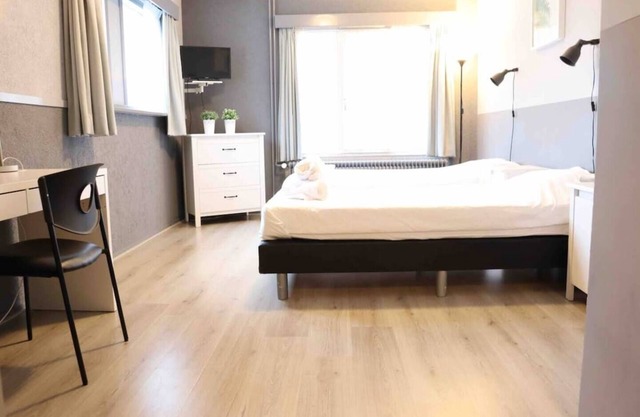 DenBerg building, formerly a small hotel, now offers 7 bedrooms with heating and air conditioning.