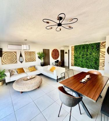 Departamento Boutique con 7 Albercas, Club de Playa y Casa Club
