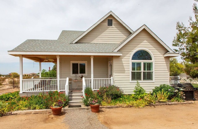 Desert Sky Cottage on 2 1/2 acres. Mountain views. Pool. Gated & fenced.