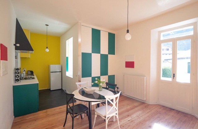 Design flat 2 min walk from beach and station with garage Bellano