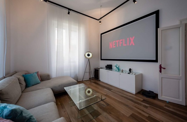 Designer abode with projector Self check-in