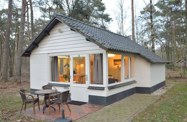 detached bungalow in a nature-filled park