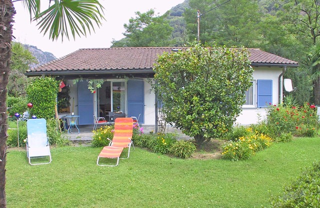 Detached house with sunbathing lawn on the edge of the village and near the River Maggia