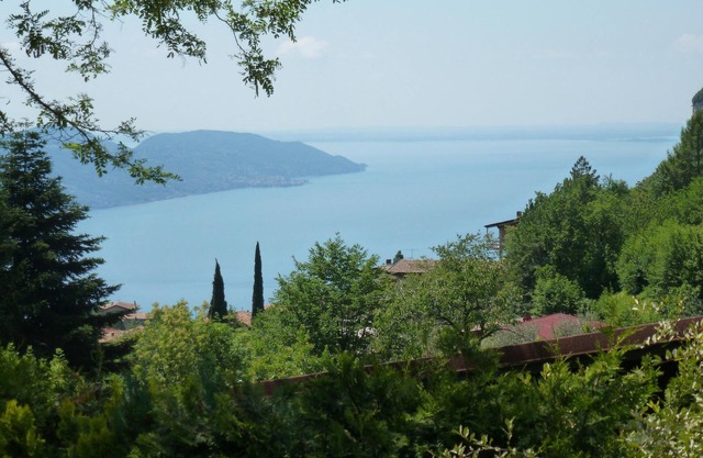 Detached sunny holiday house with lake and mountain views, pool, pellet stove