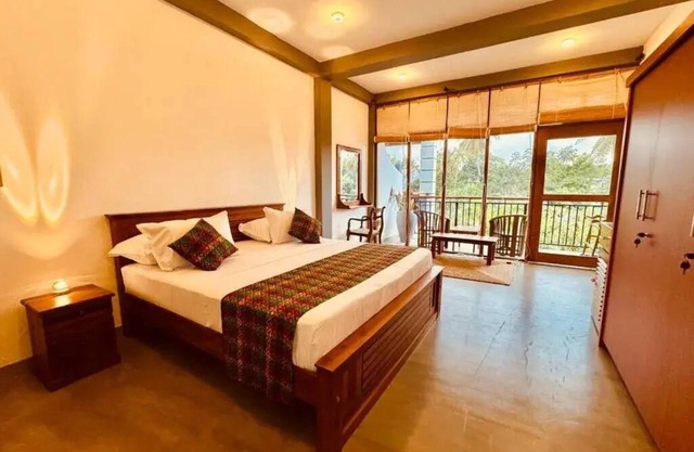 Dharma Place - King Room with Balcony 1