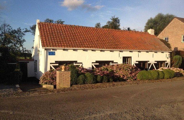 Dike House near Breskens with Stream Garden