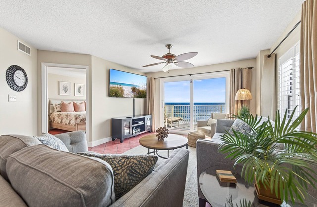 Direct oceanfront corner condo with stunning views, huge balcony, heated pool, and garage parking