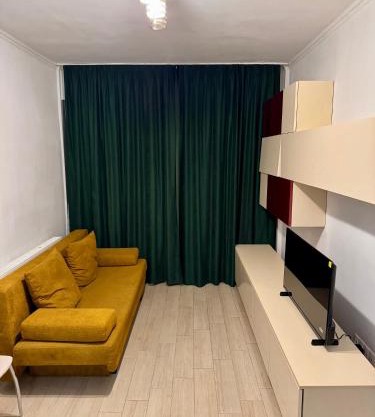 District 50 Apartment