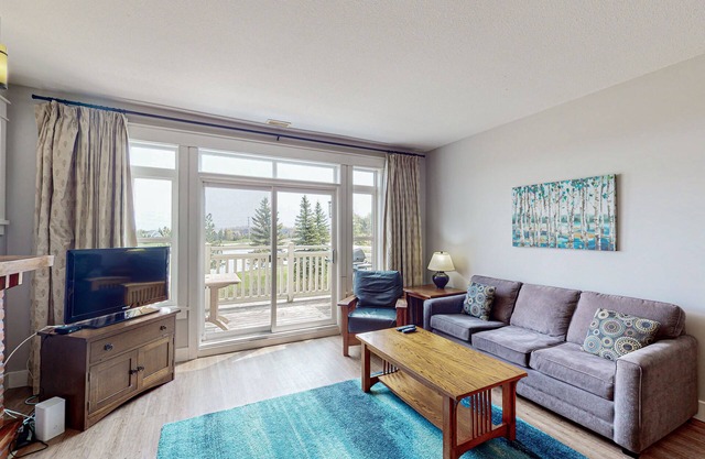 Dog-Friendly Condo w/Free WiFi, a Balcony Overlooking the Pond, & Washer/Dryer