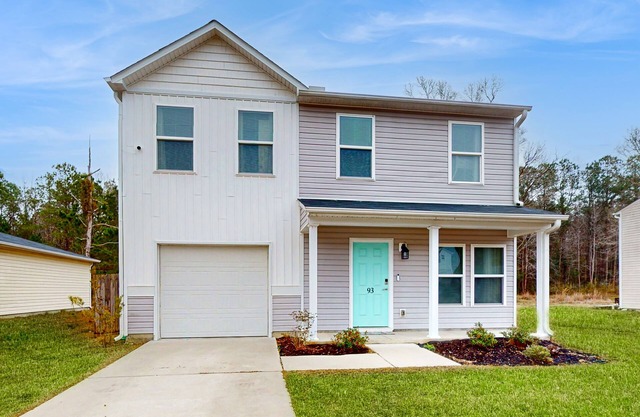 Dog-friendly coastal home with fenced in yard, close drive to the beach