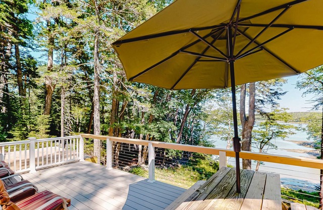 Dog-friendly cottage with water view, deck, firepit, & grill - snowbirds welcome