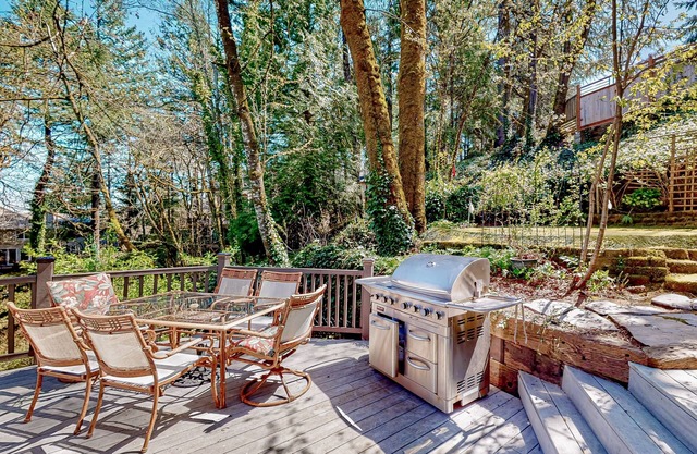 Dog-friendly, ground-level getaway with hot tub, furnished deck, & kitchenette