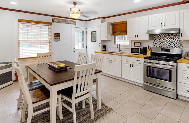 Dog-friendly home with a pool table, washer/dryer, firepit & beach access