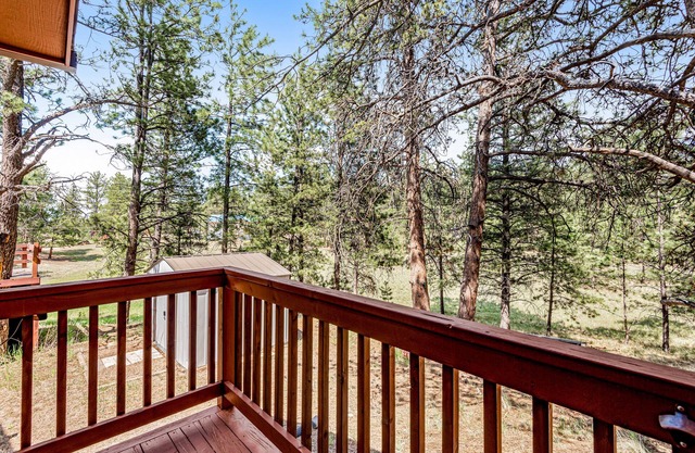 Dog-friendly home on 1.8 acres with decks, balconies, gas grill, view