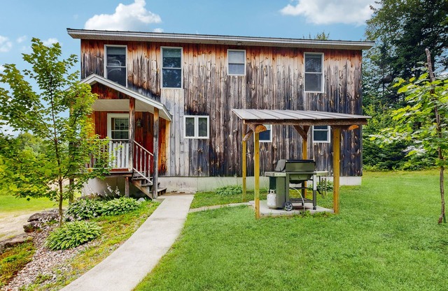 Dog-friendly home with huge yard & fireplaces - near swimming hole, snowmobiling