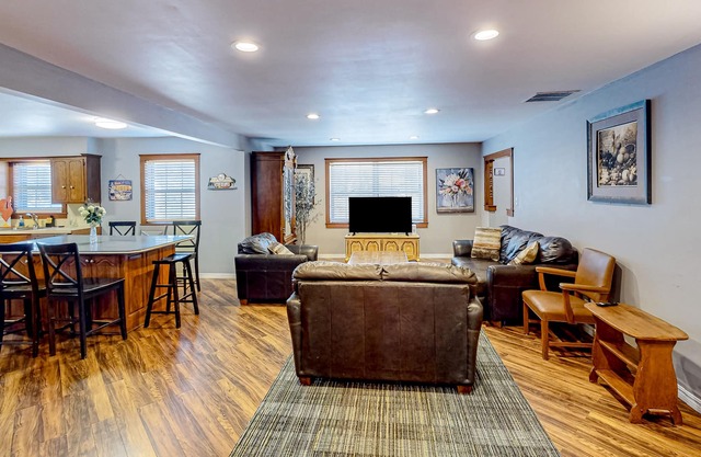 Dog-friendly home with large yard, grill, & basketball hoop