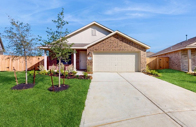 Dog-friendly home with a large, fenced yard, washer/dryer, & central AC