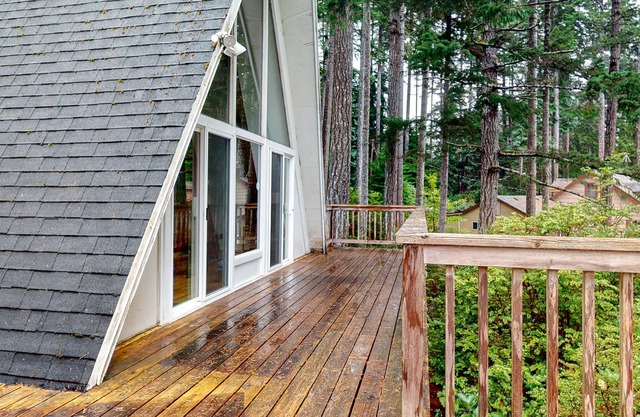 Dog-Friendly Home with Expansive Deck with Hot Tub and Dock on Woahink Lake